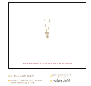 Dettaglio collana con ciondolo tigre, pietra occhio di gatto e catena oro 40+5cm