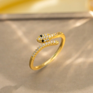 Elegant gold snake open ring with white cubic zirconia and black gemstone eyes