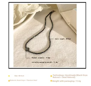 Detail van hematiet kralenketting met titanium stalen kruishanger en de afmetingen