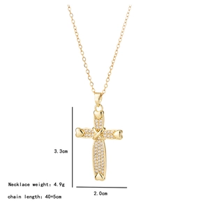 Detailed view of gold-plated crystal cross pendant with heart accents and dimensions