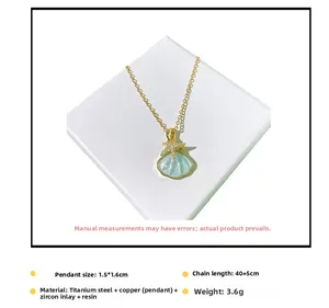 Détail du pendentif coquillage et étoile de mer avec longueur de chaîne 40+5cm