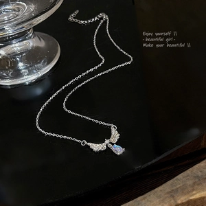 Elegant silver angel wing necklace with moonstone teardrop pendant and o-chain necklace