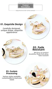 Detailed close-up showing gold alloy rocking horse charms with colorful enamel finish