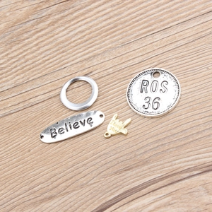 DIY alloy charm set with Believe oval tag, ROS 36 disc, and I Love You hand gesture pendant