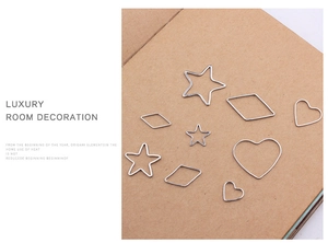 Silver geometric metal charms including stars and hearts for DIY jewelry making
