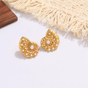 Elegant gold seashell stud earrings with white pearls for women in a luxury aesthetic