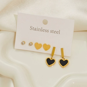 Three-pair stainless steel earring set featuring black heart charms and cz studs