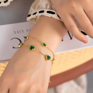 Elegant gold double-layered heart and oval green zircon bracelet for women