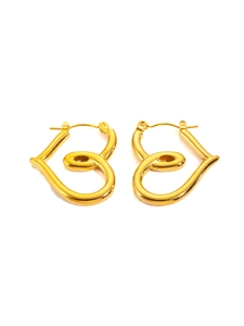 Detail of gold heart-shaped intertwined earrings with a textured twist design