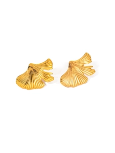 Macro detail of gold ginkgo leaf earrings with fine radial texture and polished finish