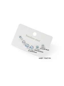Detail of square-cut cubic zirconia stud earrings in three sizes on stainless steel cards