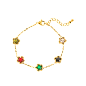 Macro view of gold stainless steel bracelet with five colored star-shaped crystal pendants