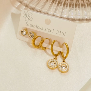 Three-pair gold stainless steel earring set with cubic zirconia studs and hoop charms