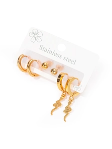 Macro view of three pairs of gold stainless steel earrings including studs and hoops