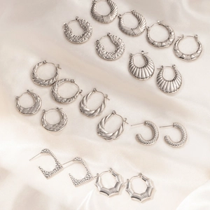 Set van titanium stalen oorringen met diverse geometrische texturen voor dames