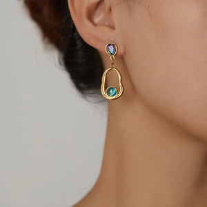 Irregular oval stainless steel earrings with cat eye stone and purple gem for women