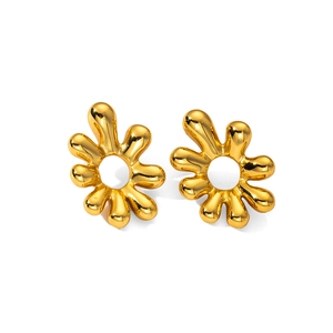 Detailed macro view of glossy gold irregular artistic earrings with smooth polished finish
