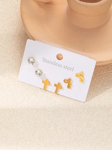 Détails du lot de boucles d'oreilles en acier avec croix, nœud et zircon sur support
