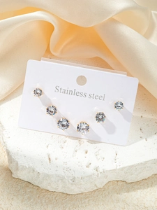 Détail du lot de 6 boucles d'oreilles en acier inoxydable doré serties de zircons clairs