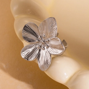 Silver flower ring with brushed texture petals and adjustable band for women