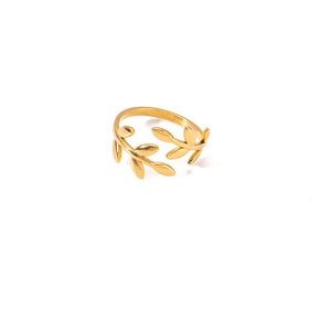 Detailed view of an olive leaf shaped adjustable open ring in a gold finish coating
