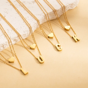 Double layered gold stainless steel necklace with heart and LUCK letter pendants