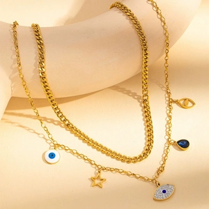 Collier doré à deux rangs avec chaîne gourmette, pendentifs œil et étoile chic