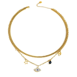 Dubbellaagse gouden ketting met boze oog en sterhangers aan een stoere cubaanse schakel