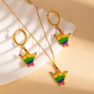Macro detail of rainbow enamel I Love You gesture pendant and earring jewelry set