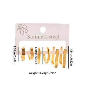 Three pairs of golden stainless steel geometric hoop earrings in a minimalist jewelry set