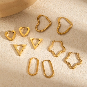 Set of minimalist geometric gold-plated stainless steel earrings with heart and star shapes