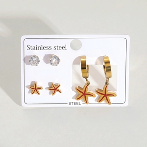 Lot de trois paires de boucles d'oreilles en acier avec pendentifs étoile de mer et cristaux