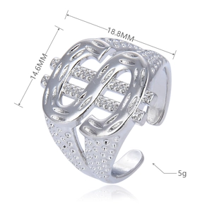 Detail view of silver dollar sign ring showing dimensions 18.8mm with adjustable open band