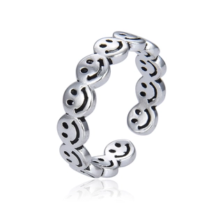 Vintage Thai silver smiley face open ring with a continuous retro hollow design