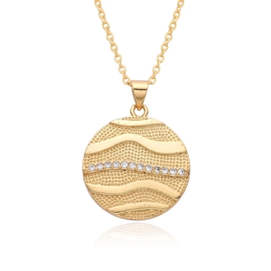 Detail of gold cupid arrow heart pendant with crystal row and wavy relief texture