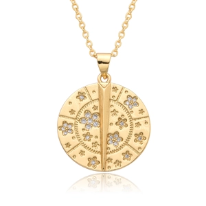 Close-up of a gold embossed heart and cupid angel pendant necklace with white zircons