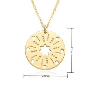 Close-up of 22mm gold star pendant with cupid arrow design on dainty cross chain