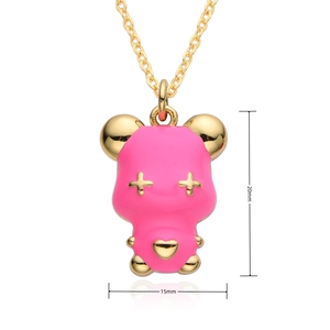 Close-up of pink enamel bear pendant with gold metallic details and 20mm height scale
