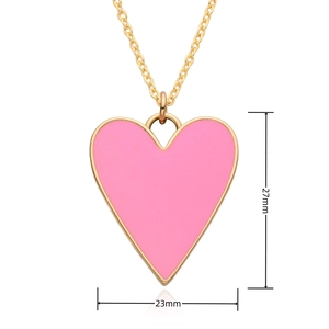 Detailed view of pink heart pendant with gold chain showing dimensions 27mm by 23mm