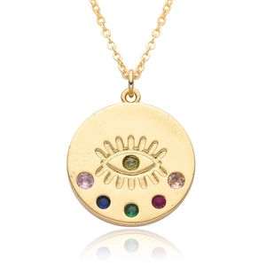 Gold plated evil eye disc necklace with multicolor zircon stones on white background