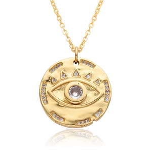 Detailed view of evil eye pendant with gold plating and sparkling cubic zirconia stones