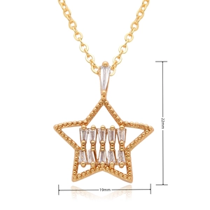 Macro shot of 22x19mm gold star pendant with rectangular cubic zirconia inlay