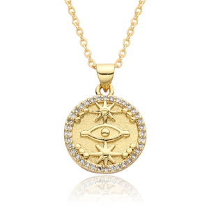 Close-up of gold-plated evil eye pendant with radiant star and zircon stones