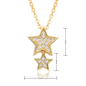 Detailed view of gold star pendants with white zircon inlay and 13mm size markings