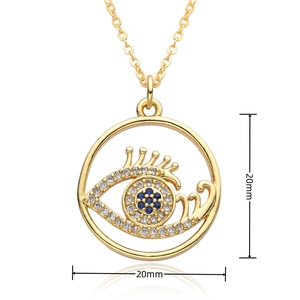 Macro view of 20mm gold plated Evil Eye disc pendant with inlaid zircon stones