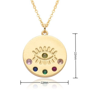 Detail of 22mm gold evil eye pendant with five colorful sparkling zircon stones
