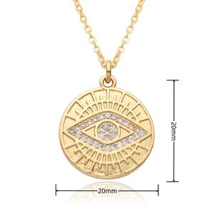 Macro detail of the 20mm round evil eye pendant with sparkling cubic zirconia inlay