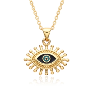 Detail of gold evil eye necklace with blue enamel pendant and fine gold chain
