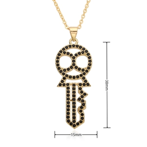 Detail view showing a 38x15mm hollow key pendant necklace with black micro-pave zircons