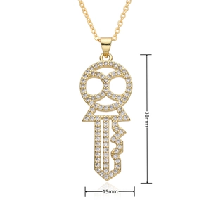 Detailed view of gold plated hollow key pendant with cubic zirconia inlay 38mm